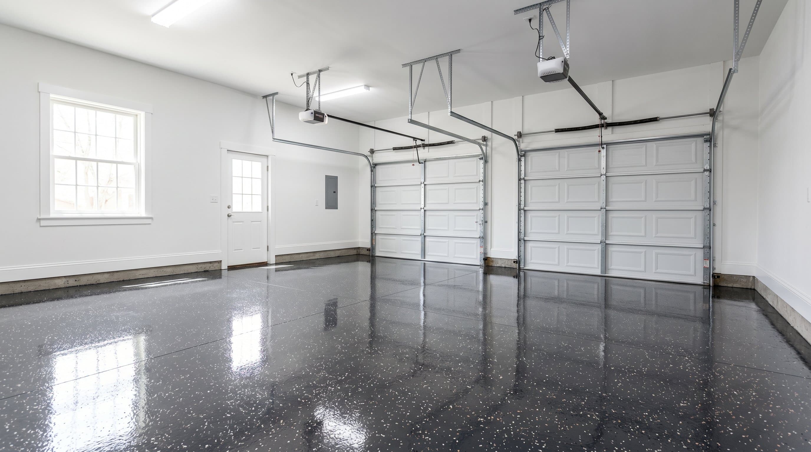 Ann Arbor garage with slate flake epoxy and copper accents.